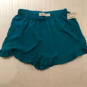 Turquoise cute flowy shorts for summer! Has tags.